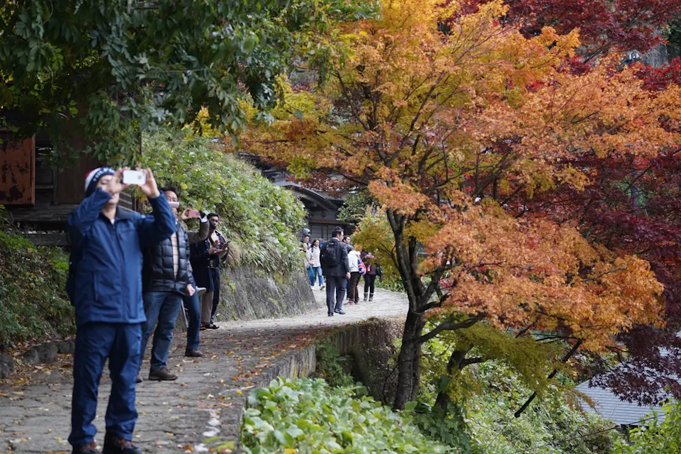 People at the viewpoint above Mount Takao San while having Maple Leaf Festival People at the viewpoint above Mount Takao San while having Maple Leaf Festival