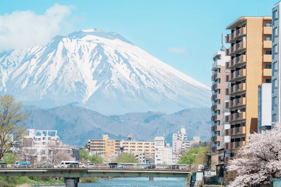 Beautiful Iwate mountain and Kitakami river with flowers blooming in Spring season