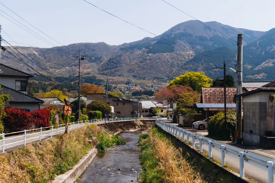 Yufuin town, Oita prefecture, Japan, hot spring onsen resort town, with mount Yufu Yufuin town, Oita prefecture, Japan, hot spring onsen resort town, with mount Yufu