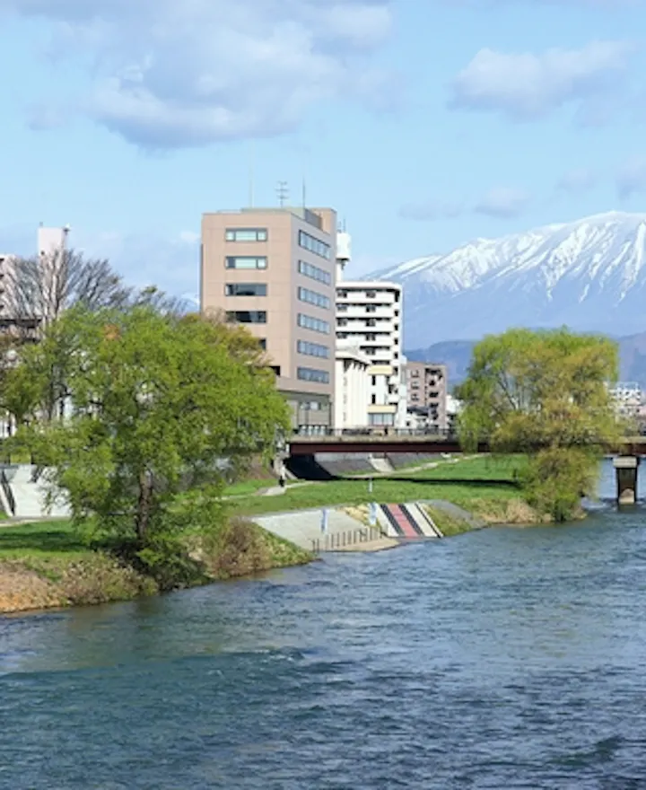 Panoramic of Iwate mountain and Morioka city and riverside walkway at Kitakami river in Morioka Panoramic of Iwate mountain and Morioka city and riverside walkway at Kitakami river in Morioka