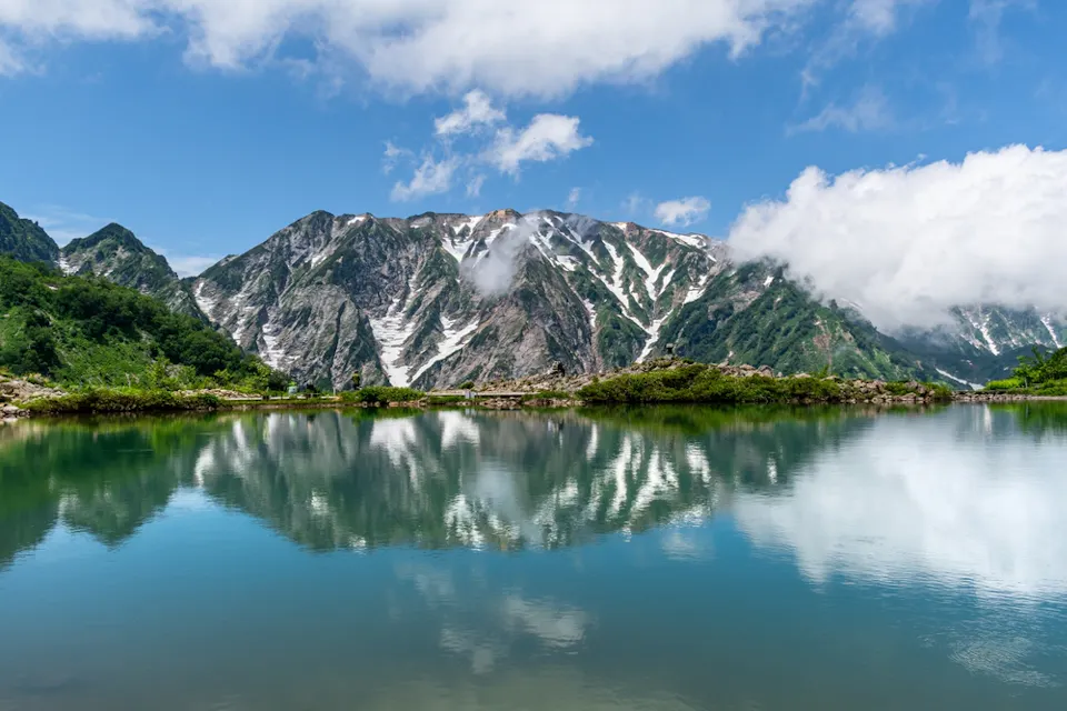 Happoike Pond and the reflection on the Japanese alps, in the Hakuba Valley