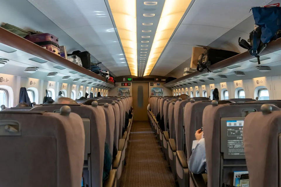 Interior view of the Green Car cabin of the Shinkansen high speed train Interior view of the Green Car cabin of the Shinkansen high speed train
