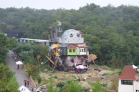 A large-scale replica of Howl's Moving Castle in the Valley of Witches area at Ghibli Park