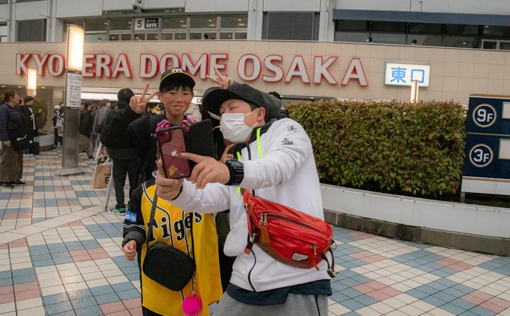 Family taking selfie at Kyocera Dome Osaka Stadium Osaka Japan Family taking selfie at Kyocera Dome Osaka Stadium Osaka Japan