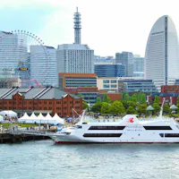A View of the "Minato Mirai 21" Area with "Marine Rouge," a Restaurant Ship, in the Port A View of the "Minato Mirai 21" Area with "Marine Rouge," a Restaurant Ship, in the Port