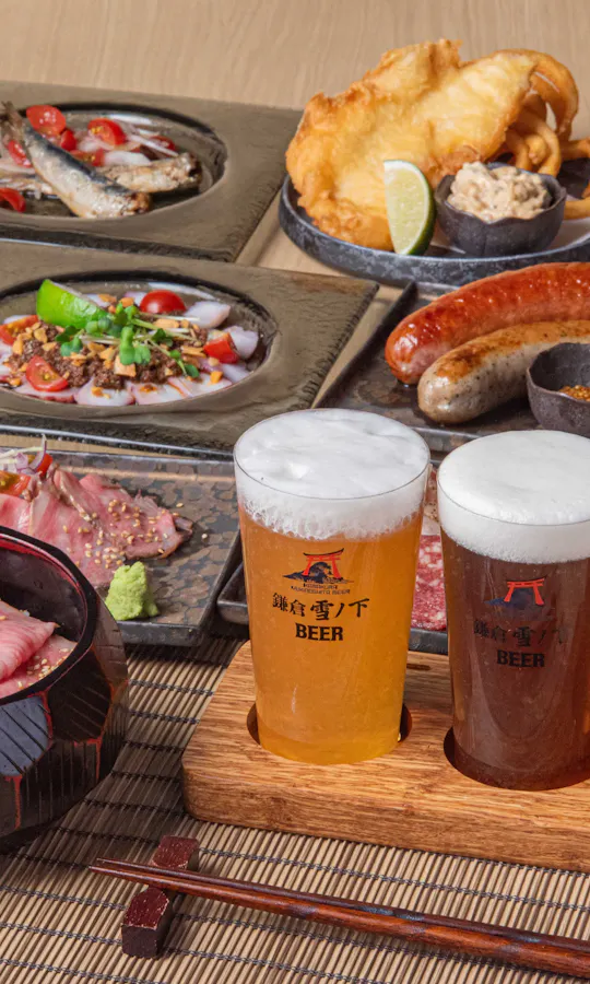 Beer tasting and a roast beef spread. Craft beer flight with roast beef and side dishes at a Kamakura restaurant