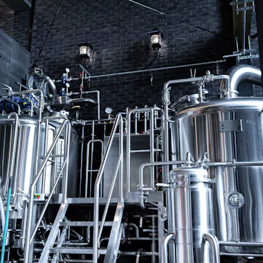 The brewhouse you see on the tour. Stainless steel brewing tanks inside a Kamakura craft brewery