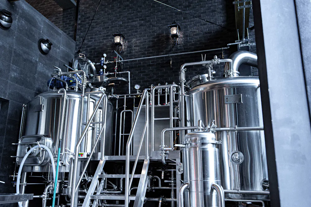 The brewhouse you see on the tour. Stainless steel brewing tanks inside a Kamakura craft brewery