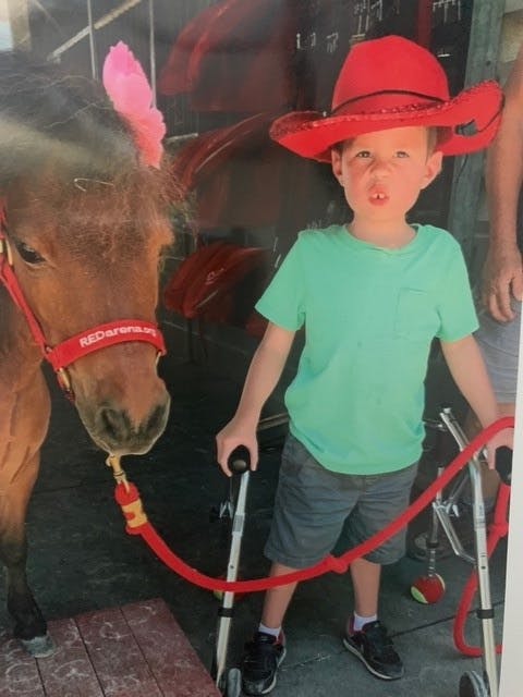 boy in a red hat