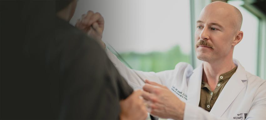 Dr. Piazza with a patient