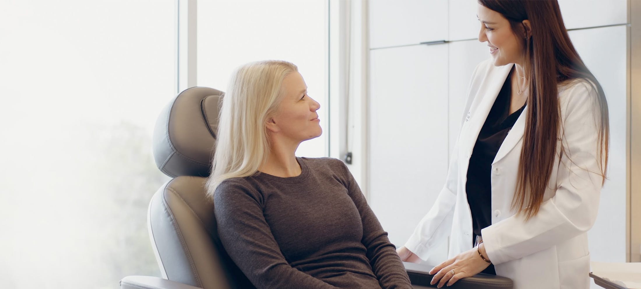 Female patient talking to a medical provider
