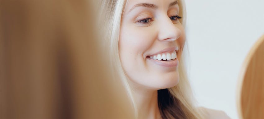 Woman with blonde hair smiling