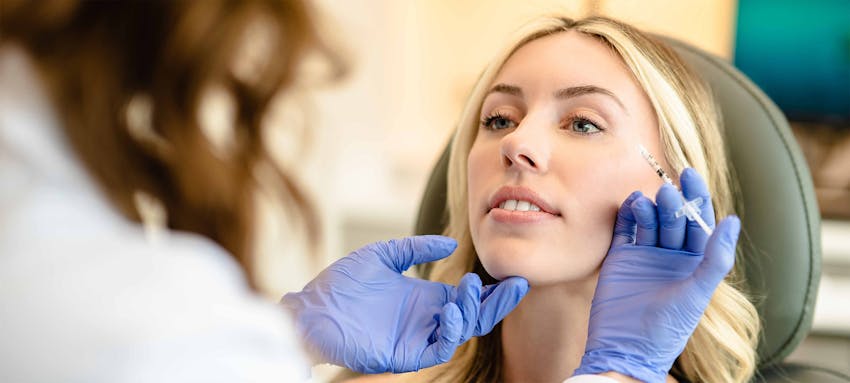 Female patient receiving injectables at The Piazza Center