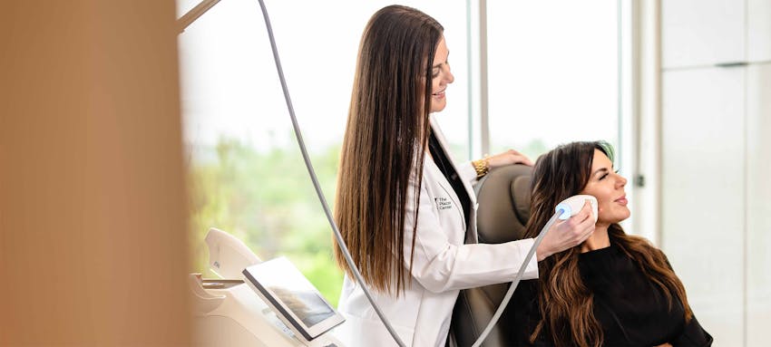 Female patient receiving a laser treatment