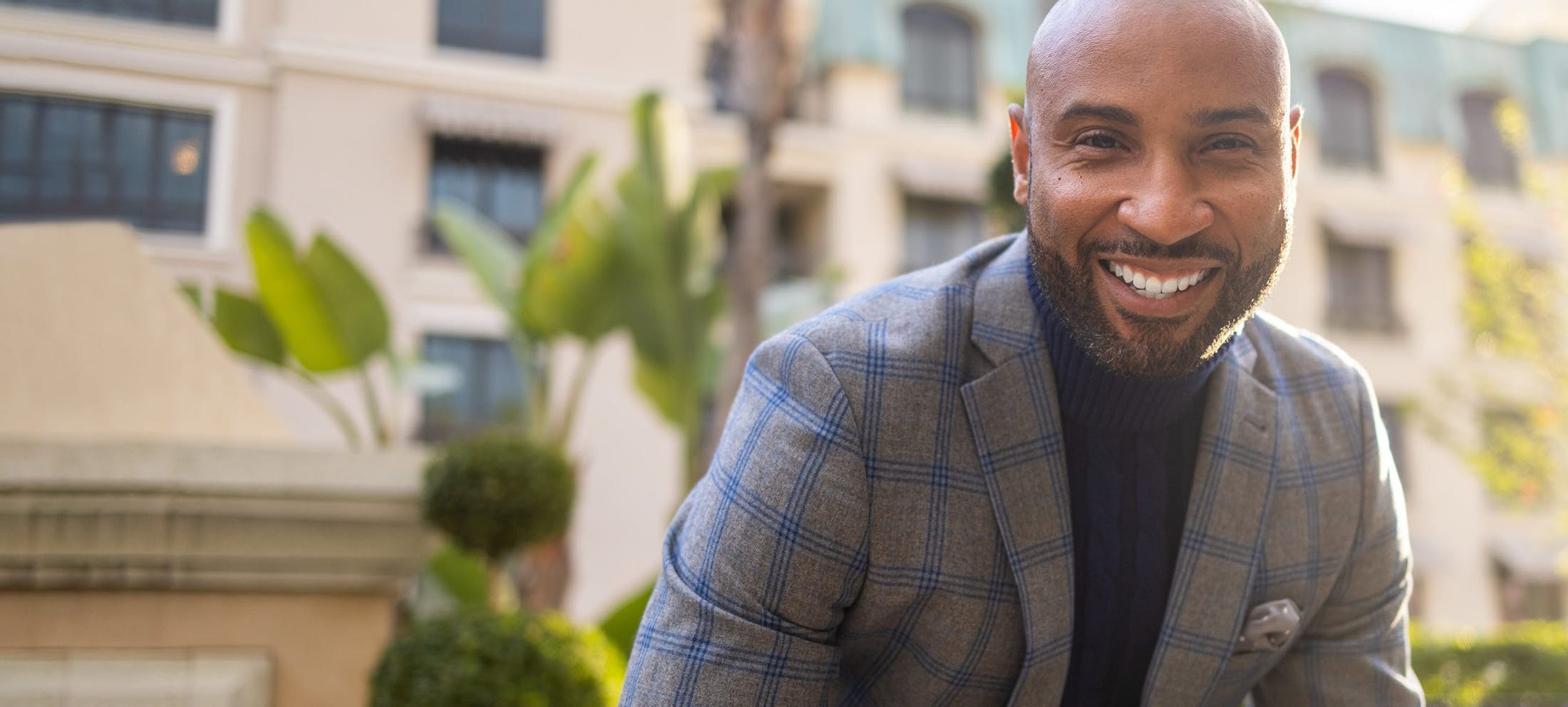 Handsome man in a plaid suit jacket