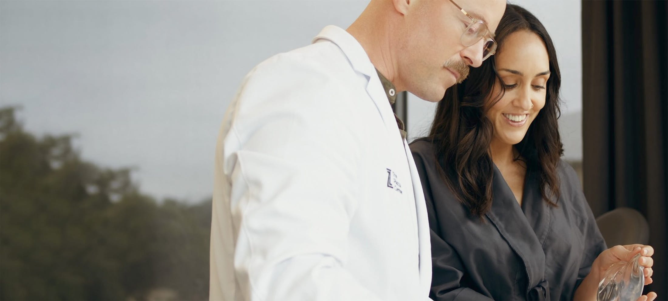 Dr. Piazza speaking with a female patient