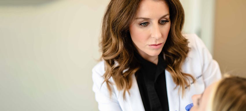 Haley Pena performing wrinkle relaxer treatments on a female patient