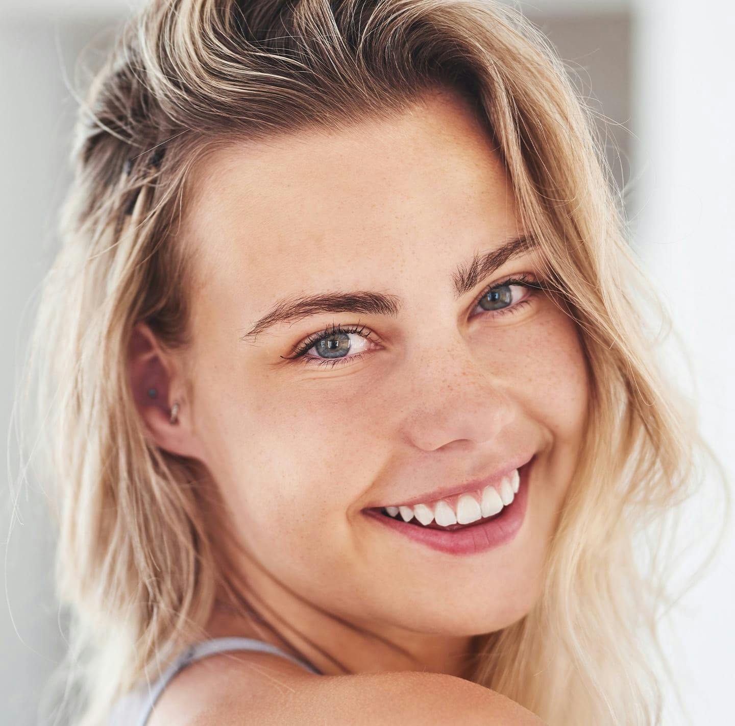 Woman with blonde hair smiling
