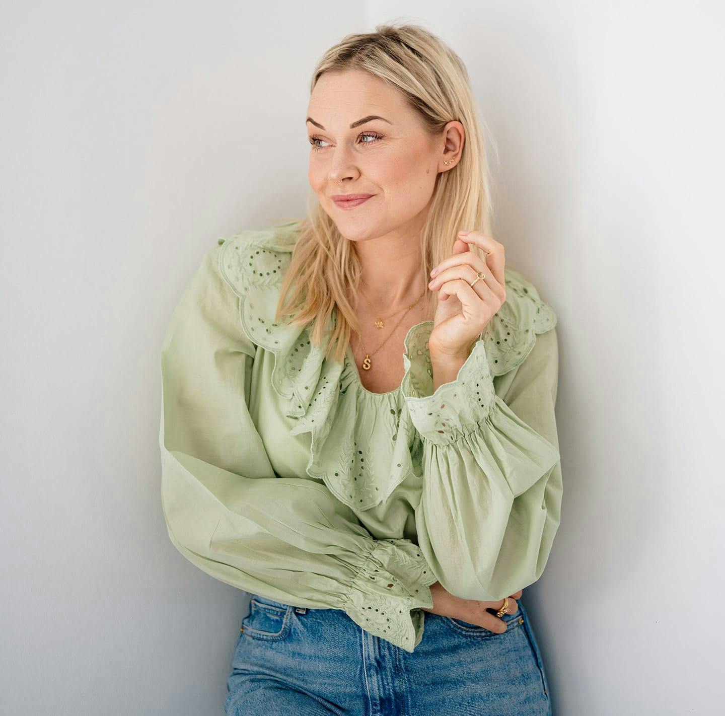 woman in a green blouse