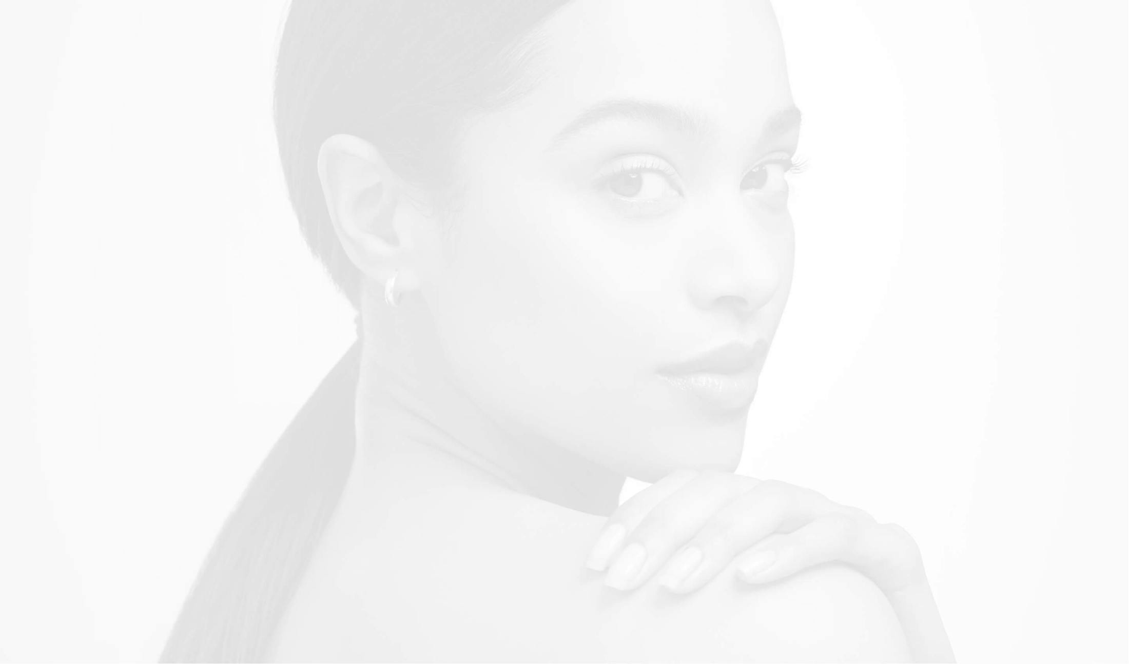 Picture of a beautiful woman looking over her shoulder