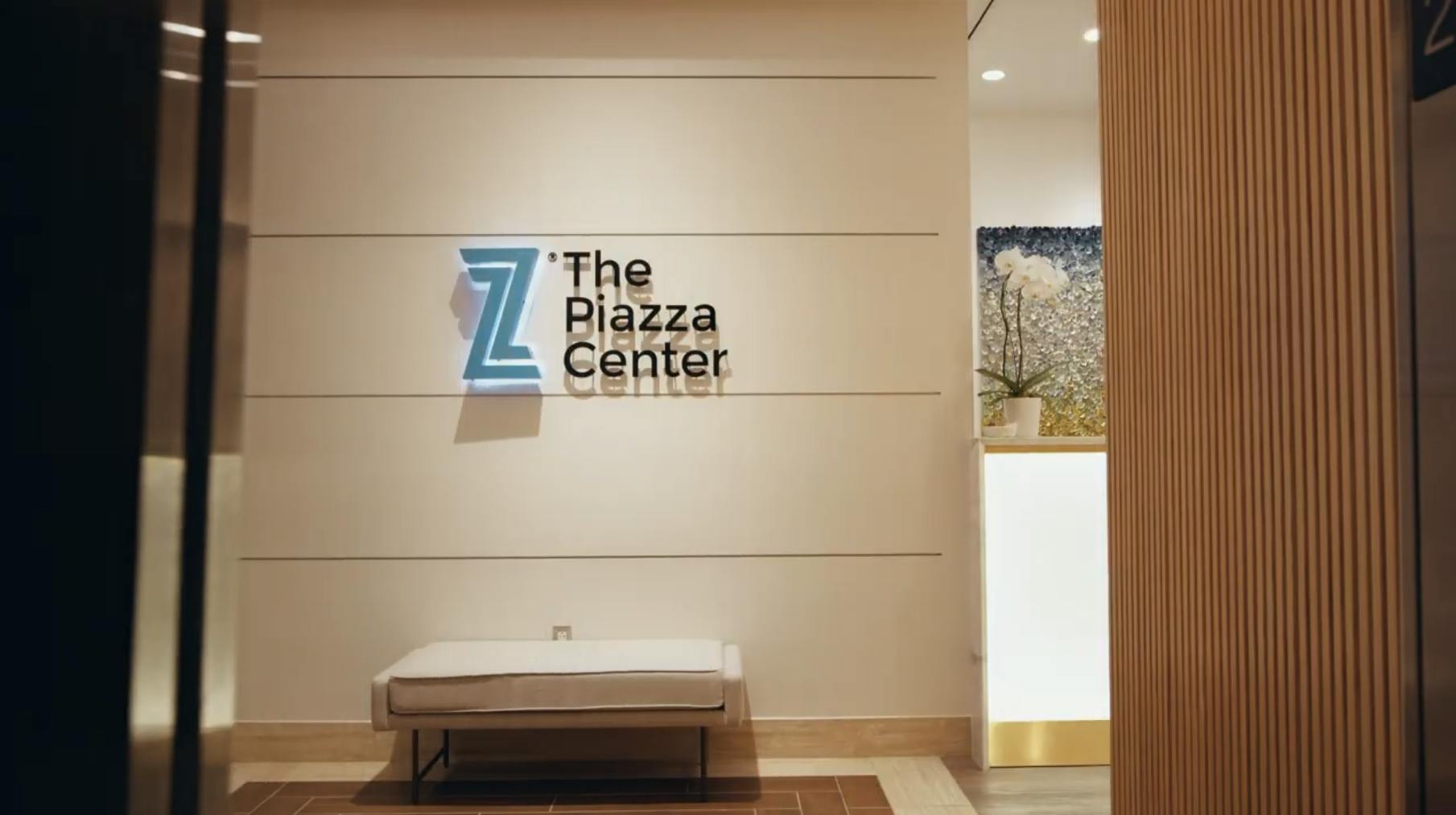 The Piazza Center sign