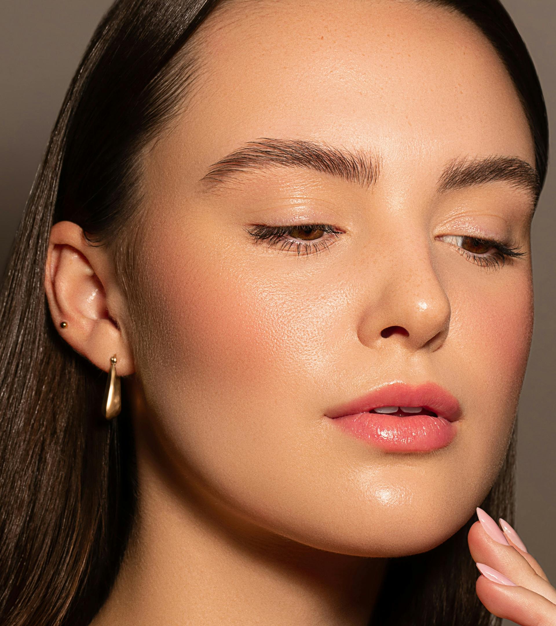 there is a woman with a pink manicure and a pink lip