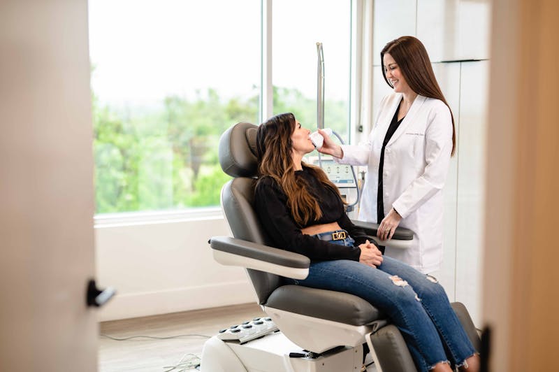 Woman getting treatment from doctor