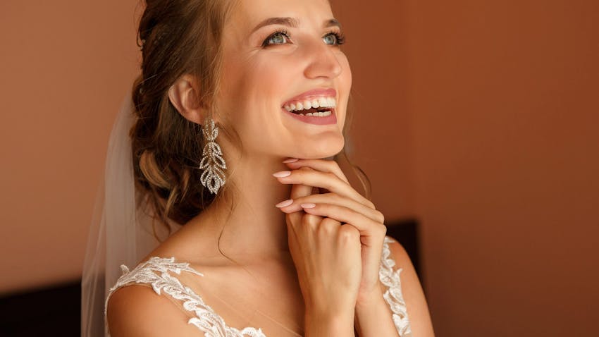 A bride smiling