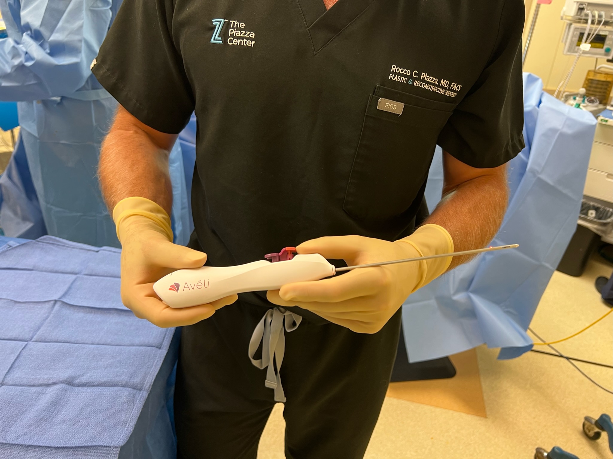Close-up image of the Avéli® device, a handheld instrument used for minimally invasive cellulite reduction treatment.