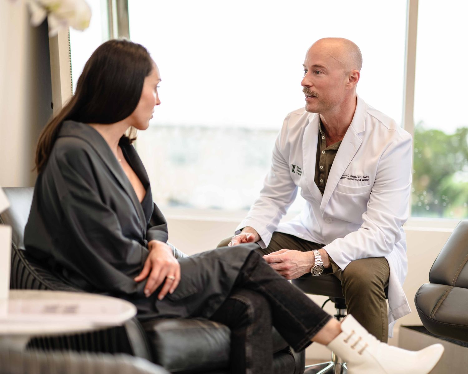 Dr. Piazza consulting with a patient