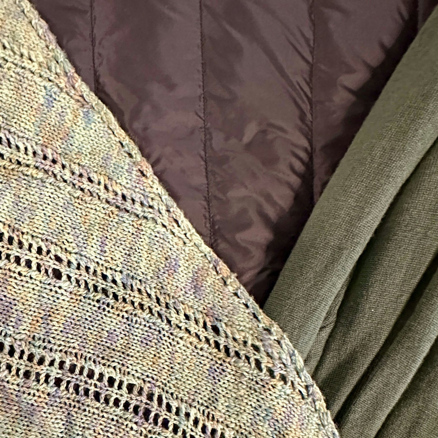 variegated shawl, maroon puffer, olive jersey