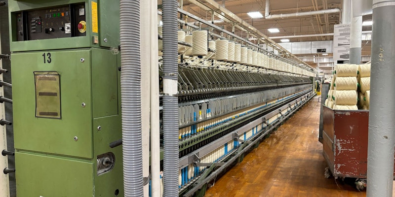 Large room filled with spinning machinery