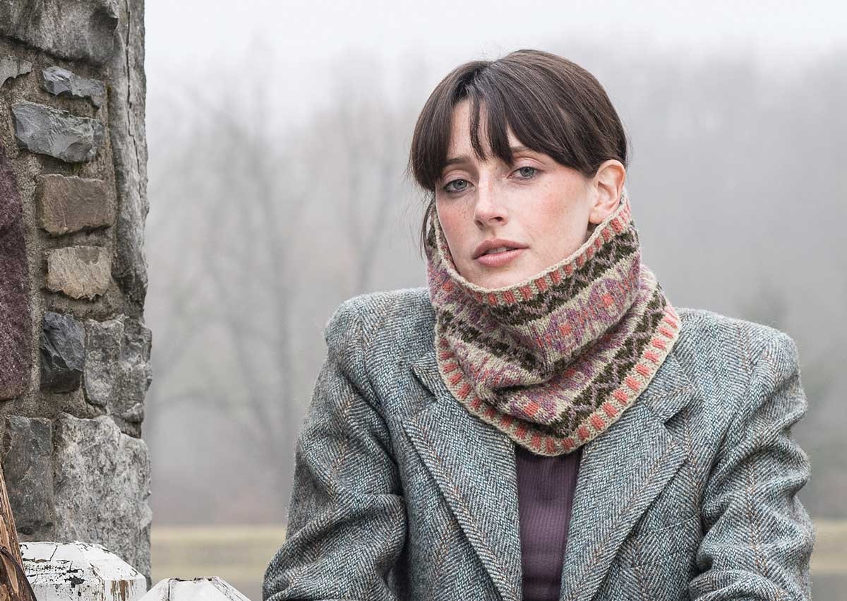 woman in gray jacket with knitted cowl