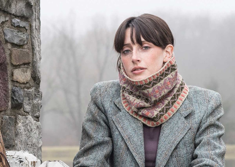 woman in gray jacket with knitted cowl