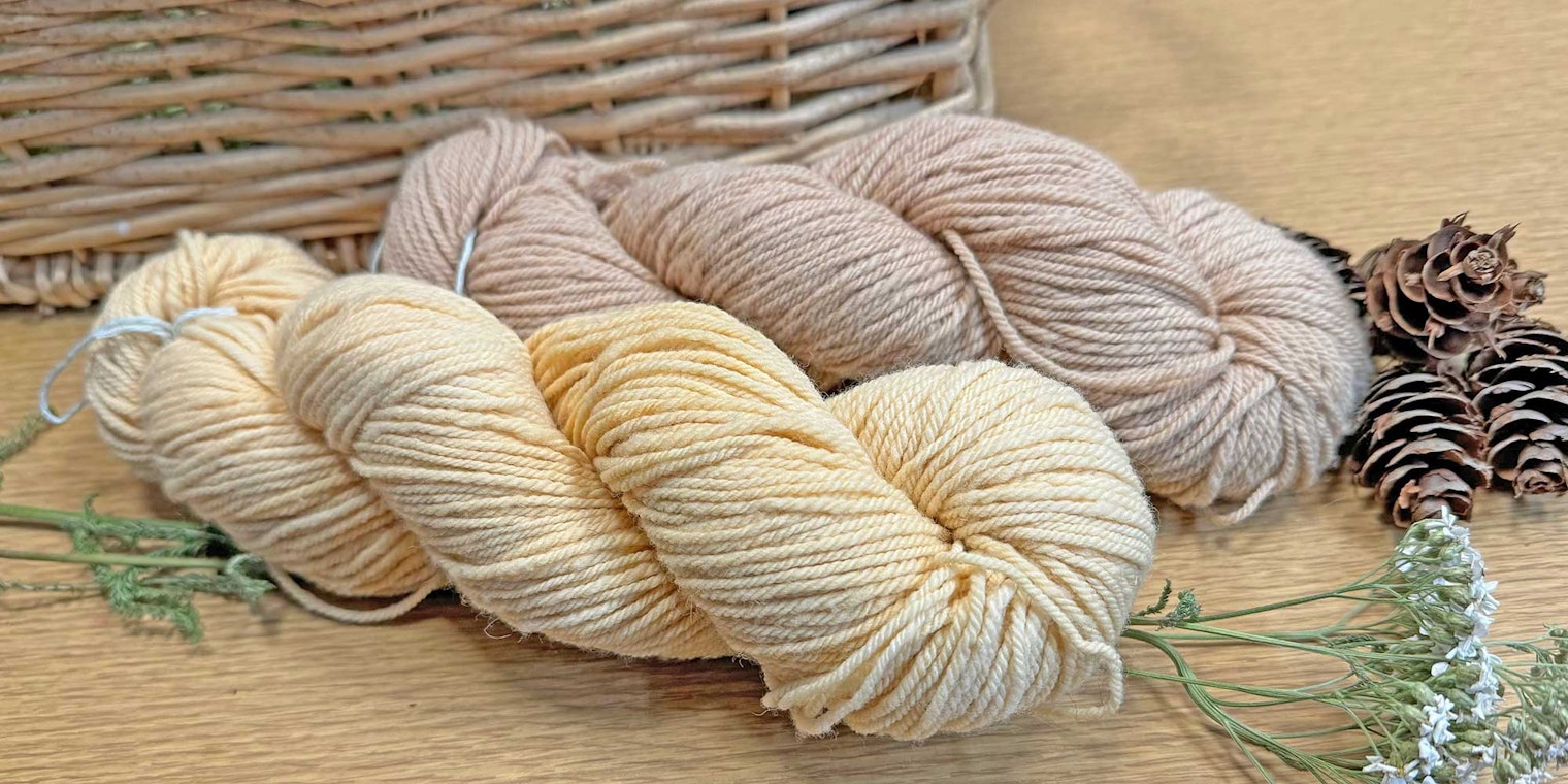 yellow and brown skeins of yarn