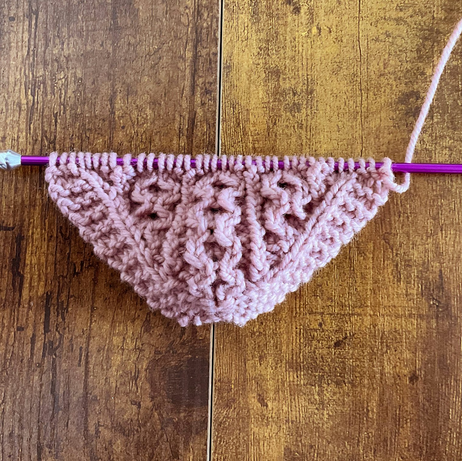 Pattern worked with worsted weight yarn on size 4 needles. The fabric is so dense that it does not lay flat.