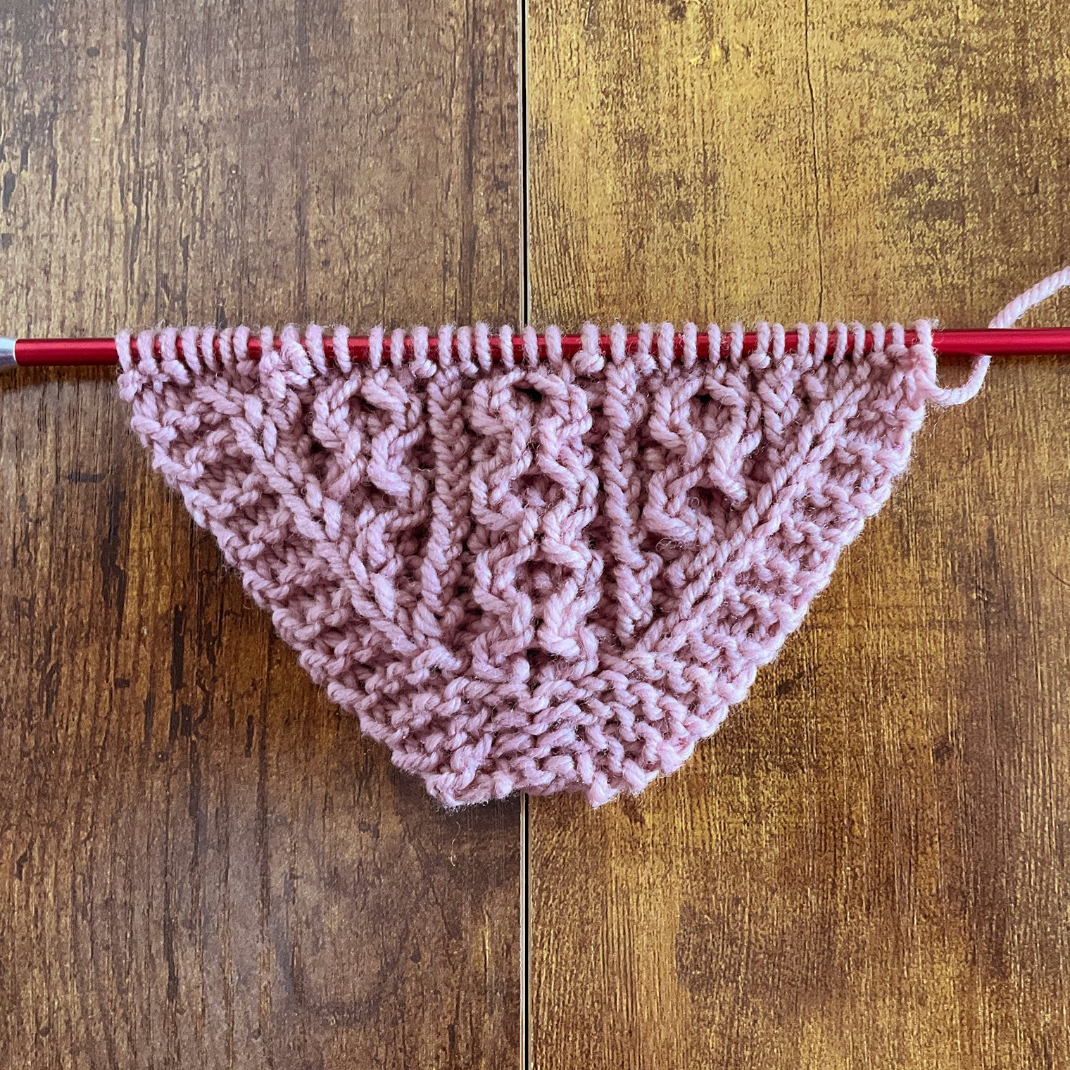 Pattern worked with worsted weight yarn on size 7 needles. The fabric has a much softer drape.