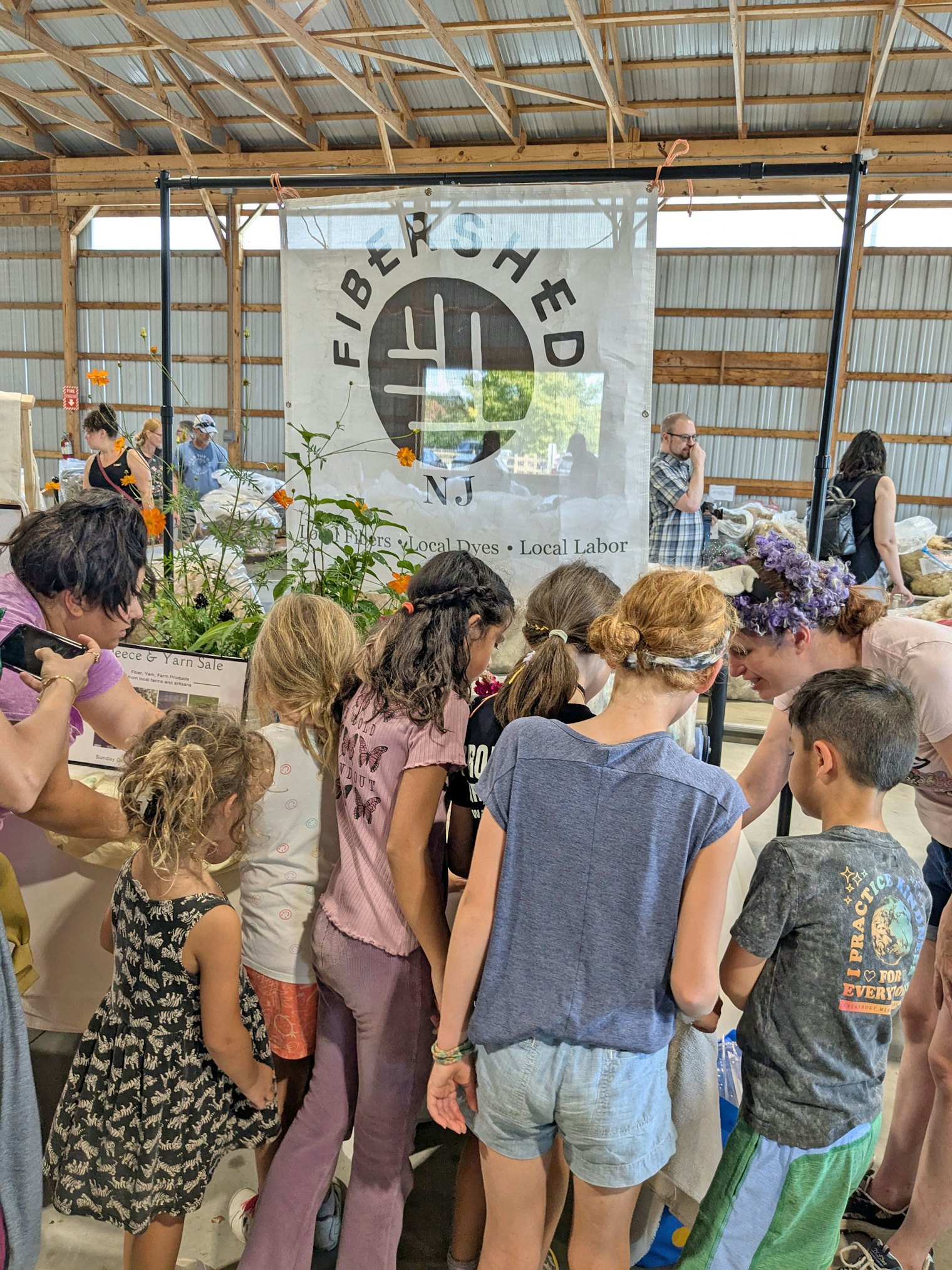NJ Fibershed sells local fleece and yarn at a community outreach event.