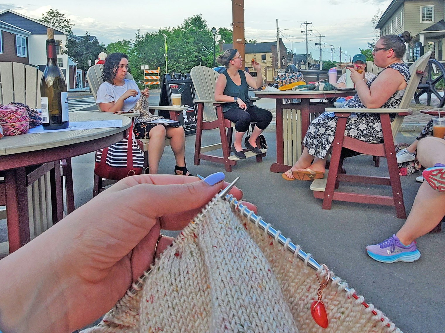 women knitting in the outdoors