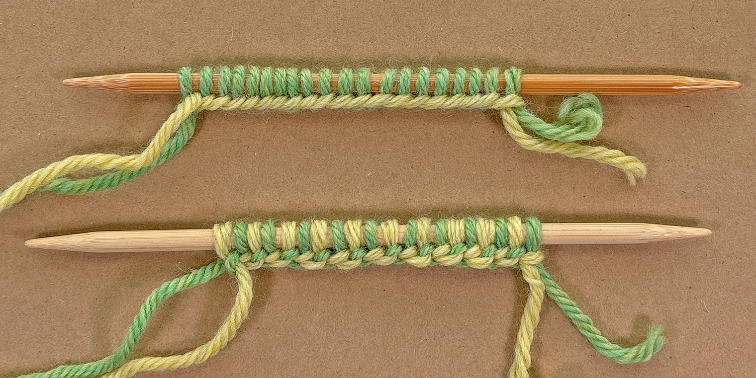 knitting needles with green and yellow yarns