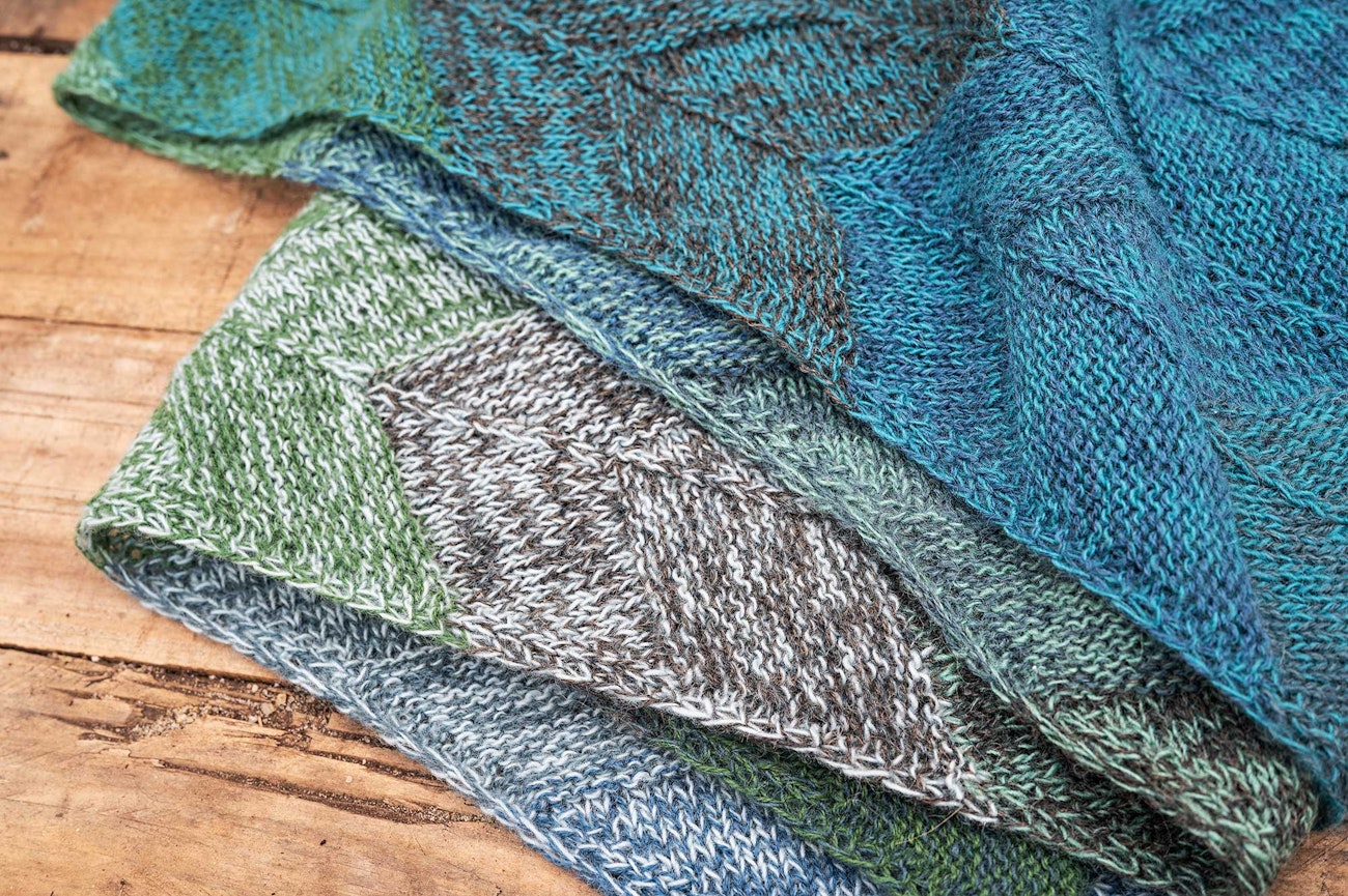 blue, green and gray knitted shawl