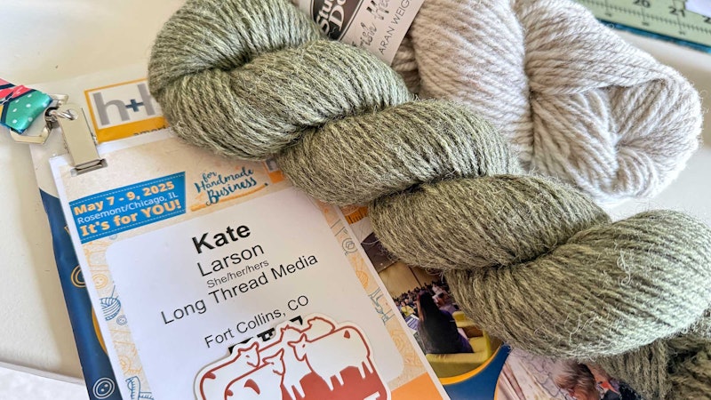 green and gray skeins of yarn