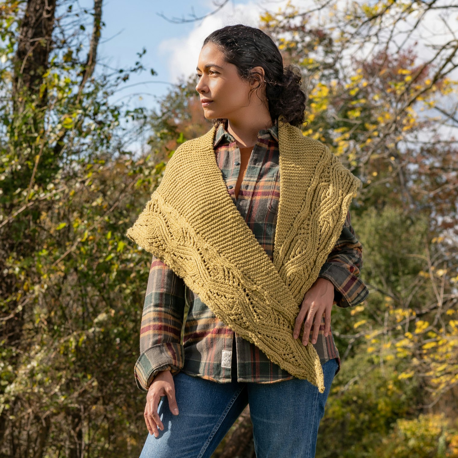 The Colubrida Wrap pairs nicely with plaid in a warm hue.