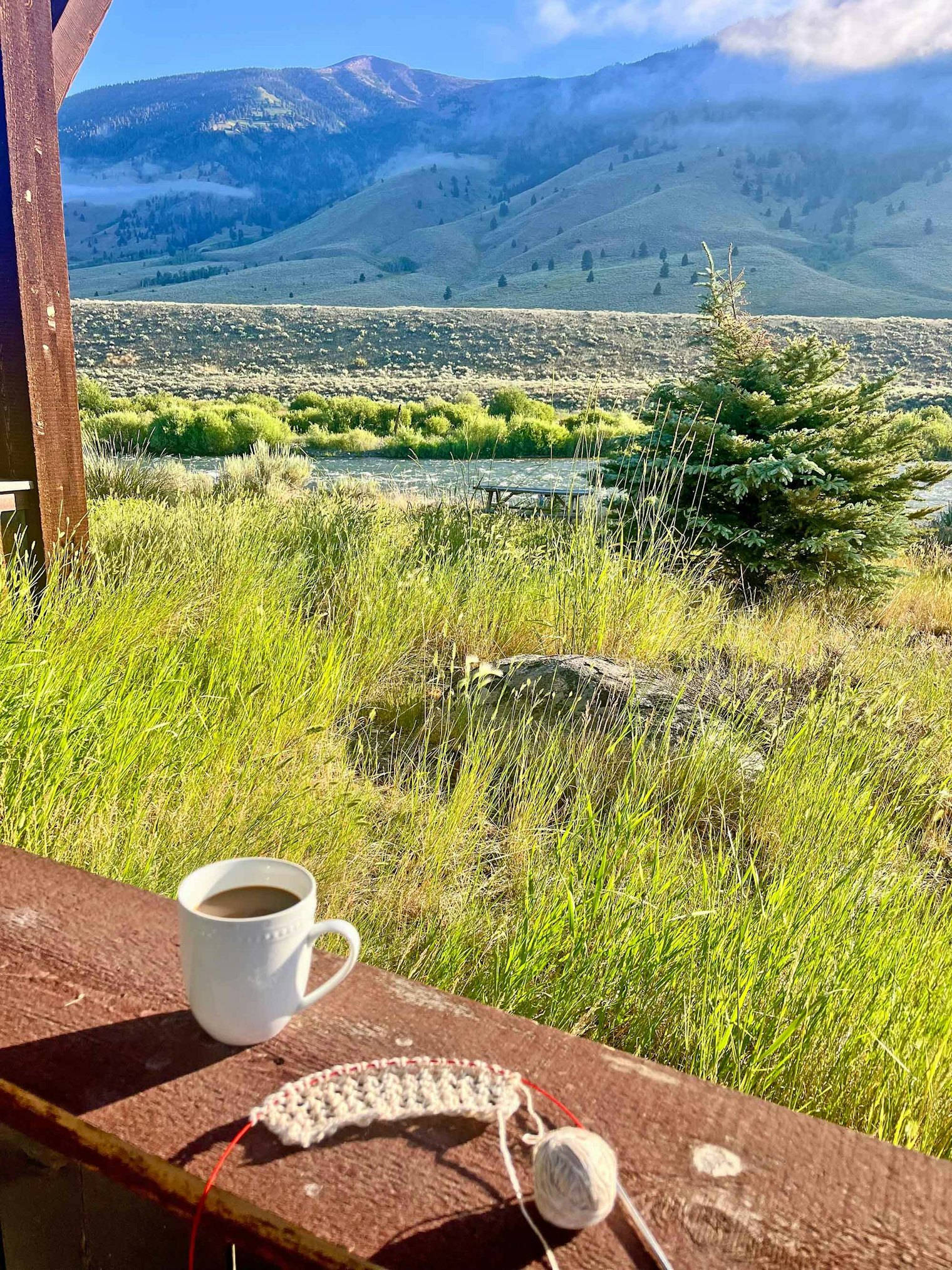 At last, Lindsay enjoys knitting in the great outdoors during a recent trip to Yellowstone National Park.