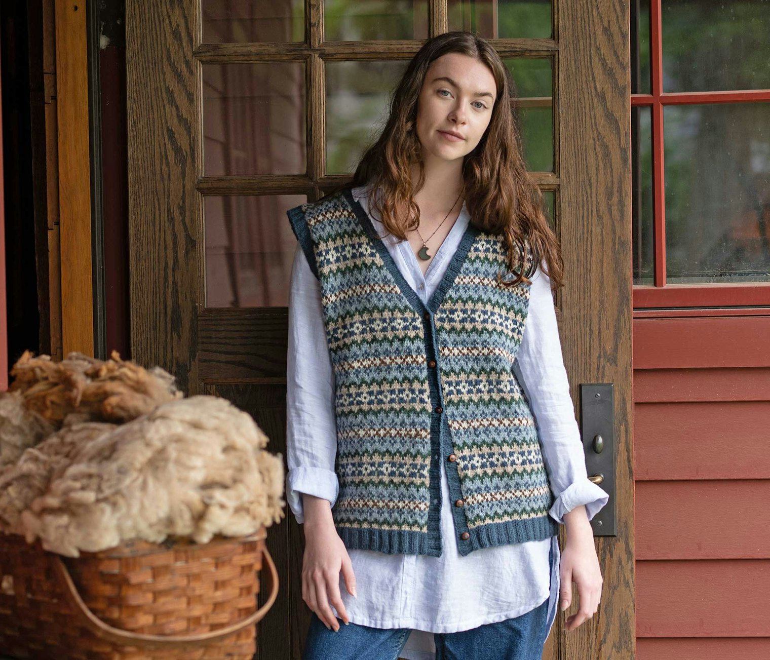 This classic button-front vest is knitted in one piece from the bottom up with steeks for the center front, armholes, and back neck.