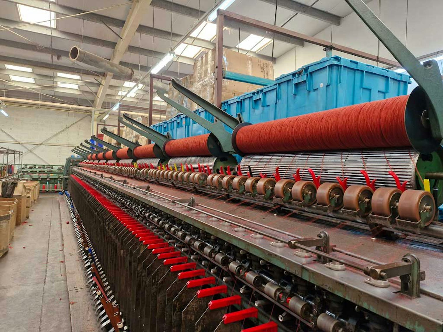 On the spinning frame, the different colors have blended into a gentle heather.