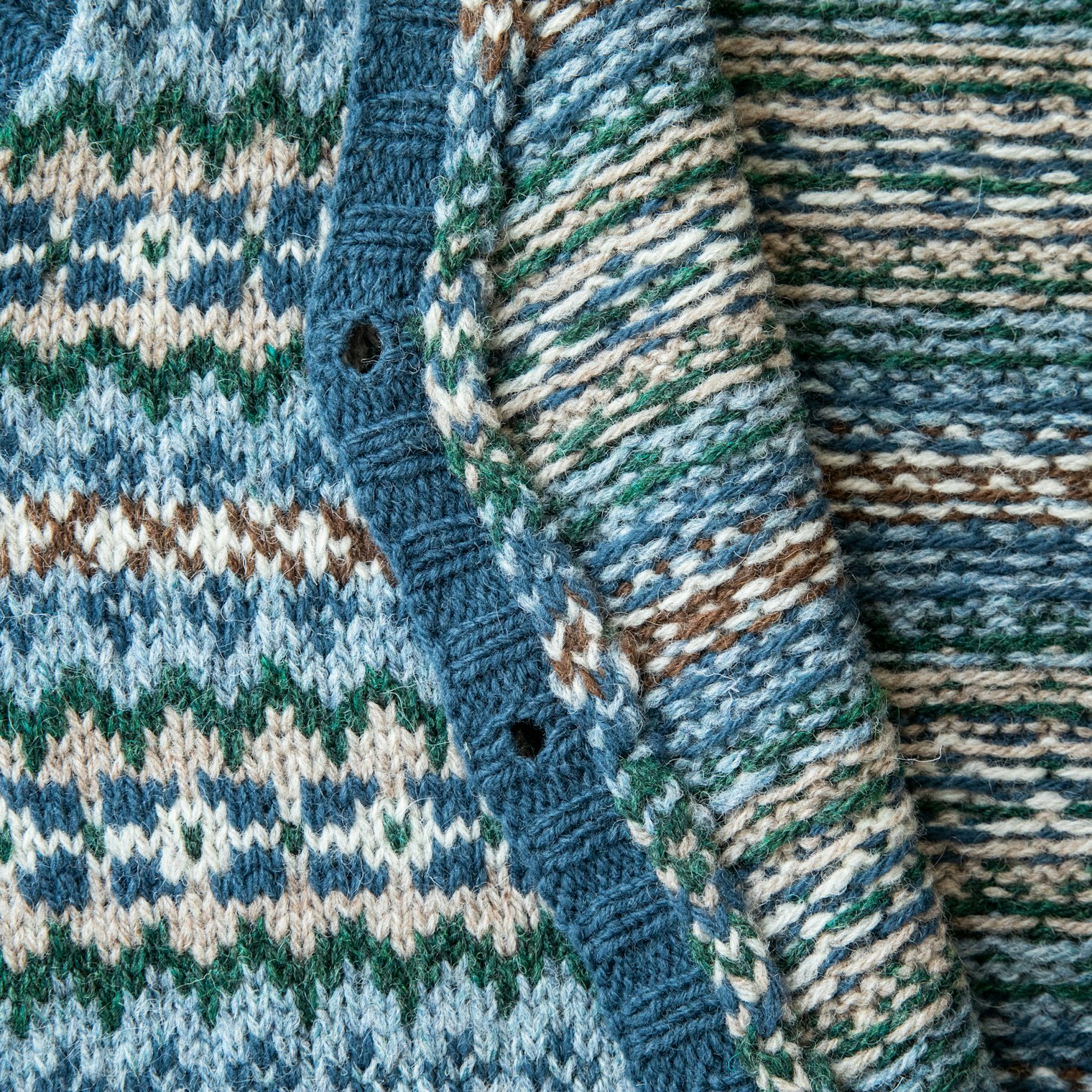 In a departure from traditional techniques, the steeks are secured with needlefelting before cutting. The inside edge is shown here.