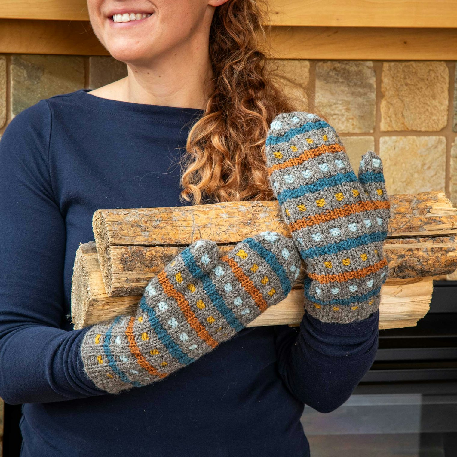 Combine different yarns and weights for a colorful pair of mittens by Sivia Harding. Knit a larger size by holding several yarns together. Photo by Matt Graves