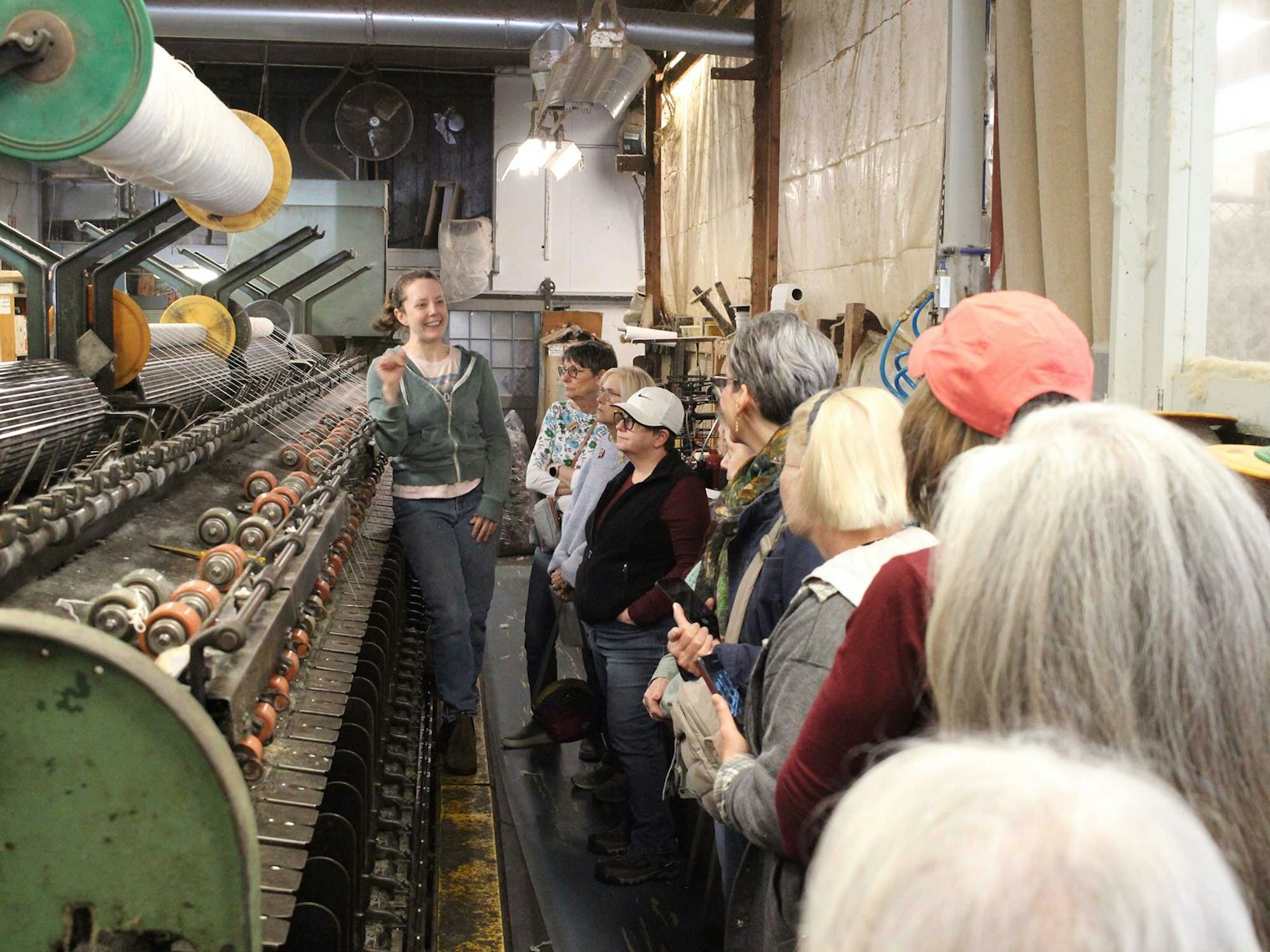 Guests get an up-close tour of the workings of Green Mountain Spinnery.