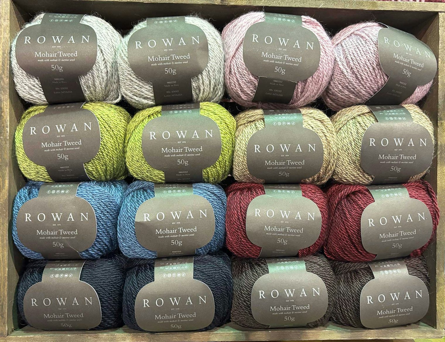 The eight colors of Rowan Mohair Tweed are dyed over a blend of dark brown Merino, white Merino, and mohair.